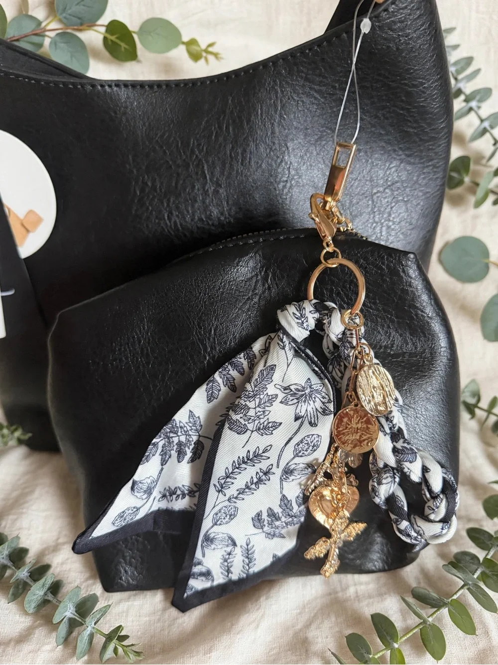 Black Women's Hobo Shoulder Bag with Decorative Scarf and Charm Accent